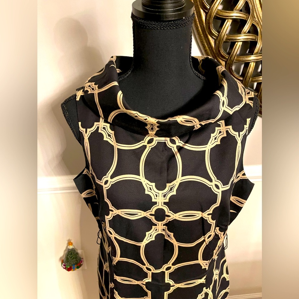 Talbots Petite size 10 straight cut dress with slim fit thru the hip.